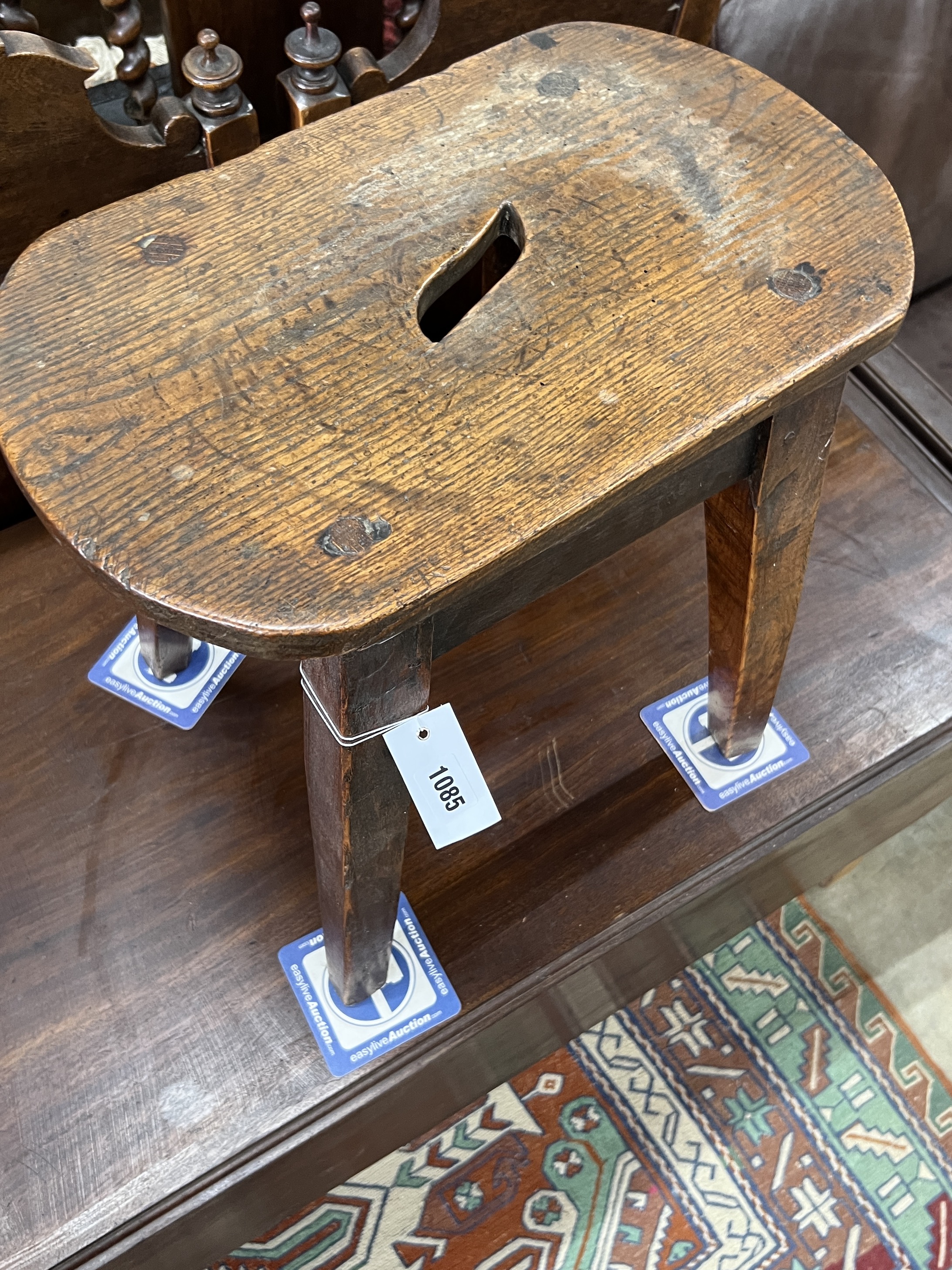A19th century Provincial elm stool, width 44cm, depth 27cm, height 42cm